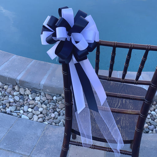 white with navy church wedding  pull pew bows 